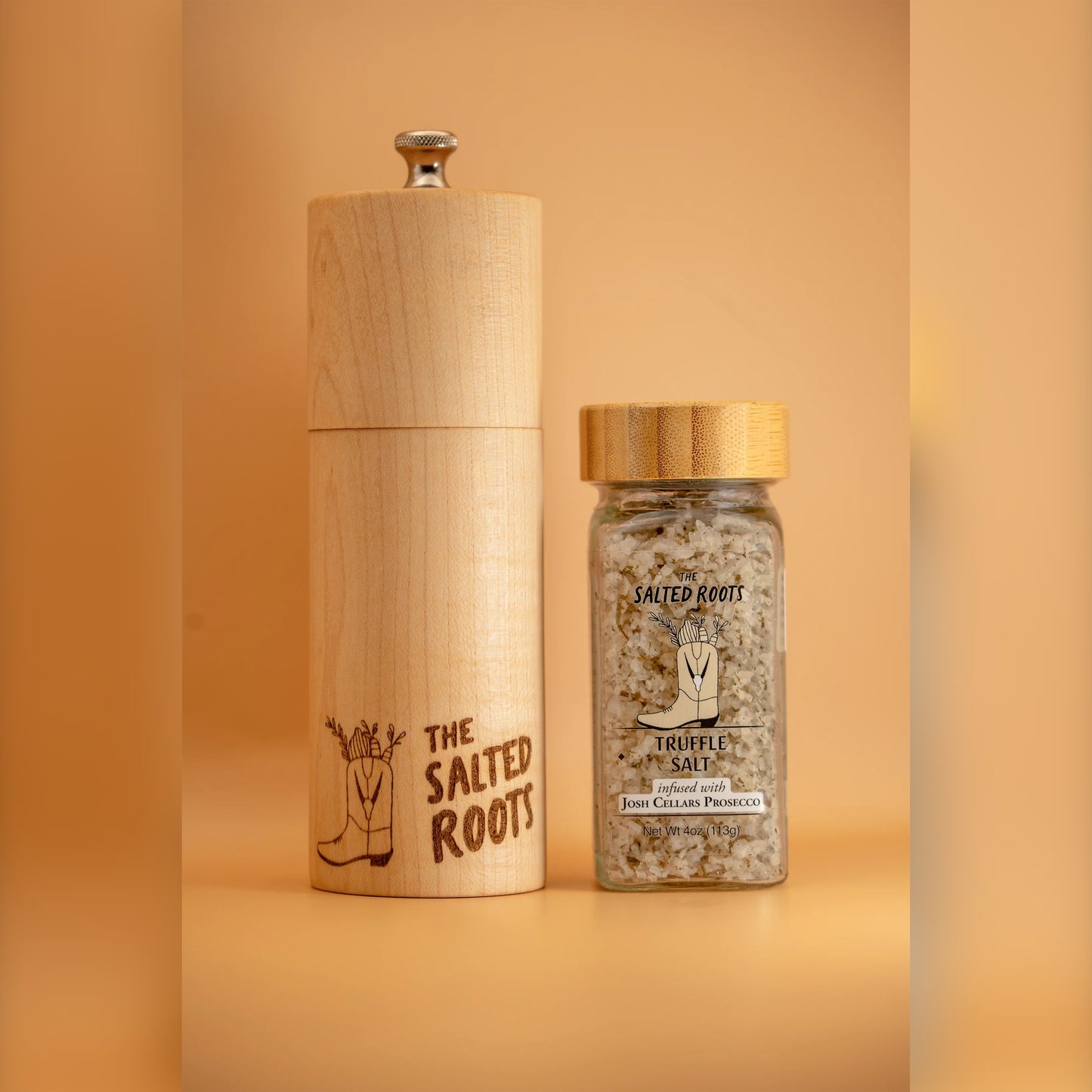 Jar of The Salted Roots Truffle Salt + Grinder, a truffle infused sea salt with grinder