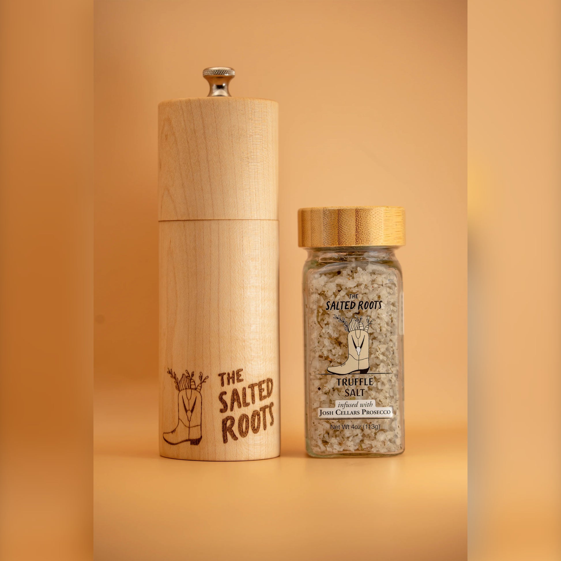 Jar of The Salted Roots Truffle Salt + Grinder, a truffle infused sea salt with grinder